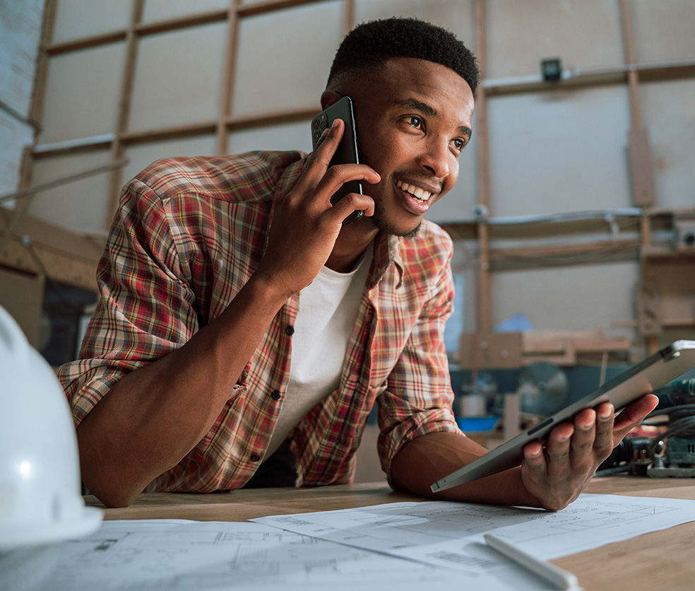 carpenter on phone